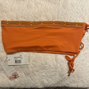 Agua Bendita swimwear top. Ties on side. Very cute! New  with tags